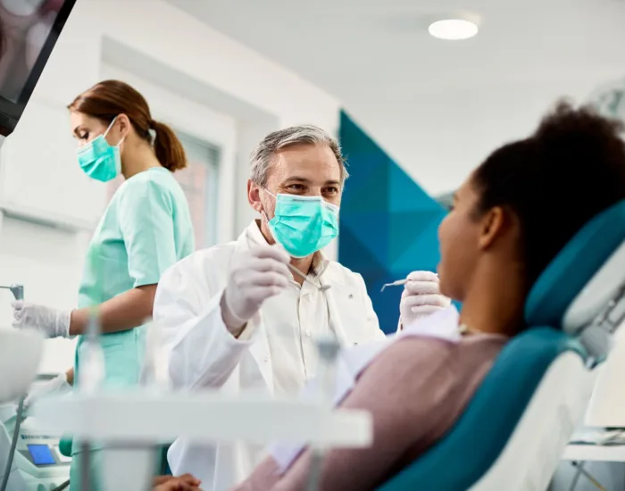 Dentist with patient